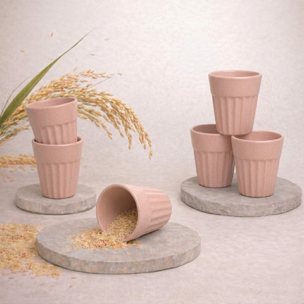 Set of 4 TurtleTales Mini Husk Chai Cups in blush pink on stone surface